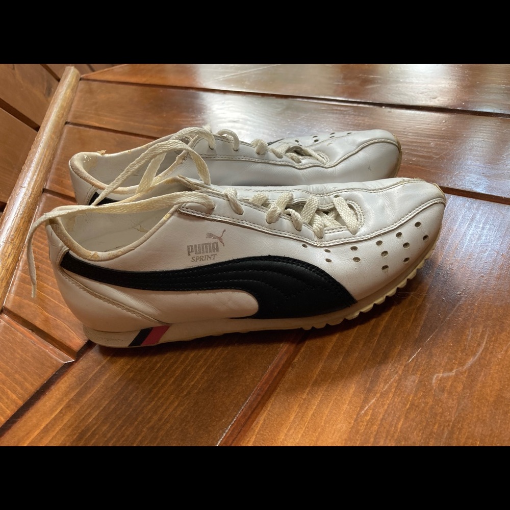 Vintage White Pumas. These are in great shape.